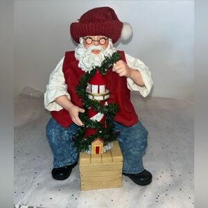 Santa with lighthouse. Clothique by Possible Dreams ..2002